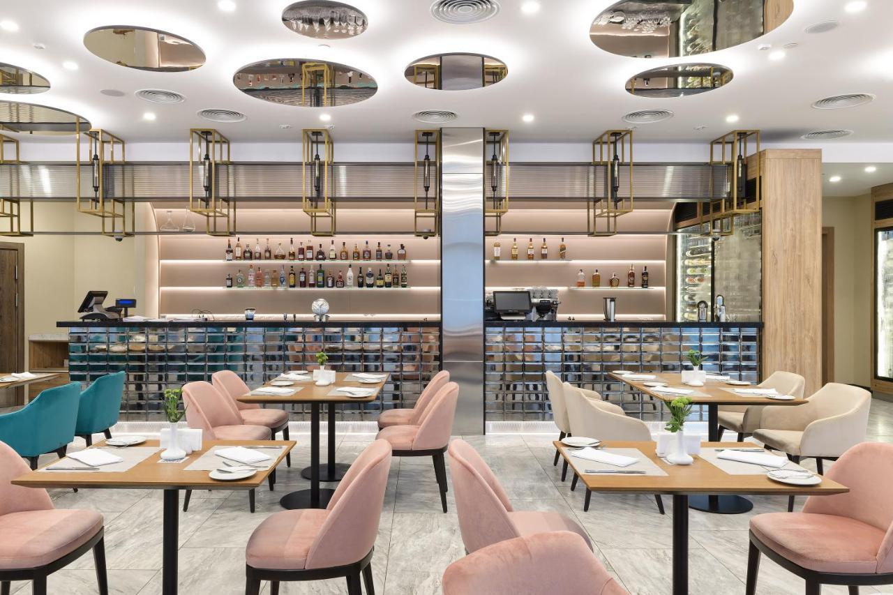 Premier Hotel โอเดสซา ภายนอก รูปภาพ The interior of the restaurant